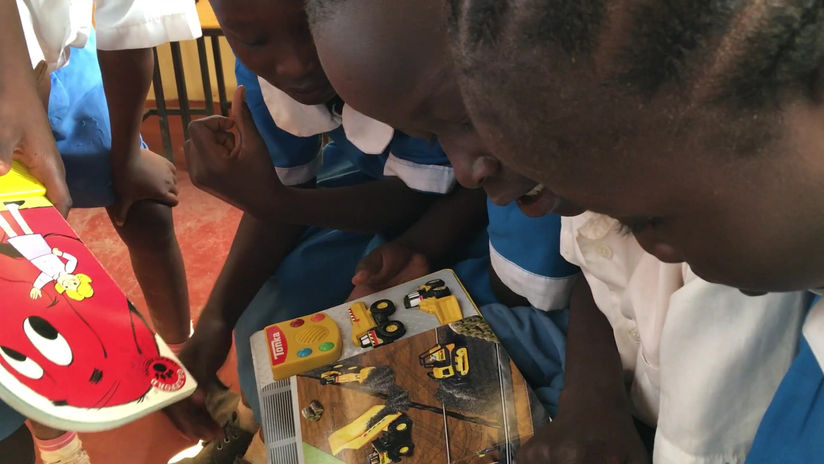 Young boys have never seen interactive “talking books” with sound